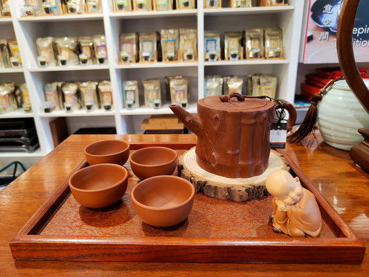 Purple Clay Teapot and 4 cups with wooden tray and little Buddha